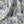 Pair of Dogs linen by Annika Reed in blue, draped close-up of pairs of dogs and vases