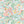 Paloma linen by Claire de Quénetain in pink, draped, showing a hand-painted floral design