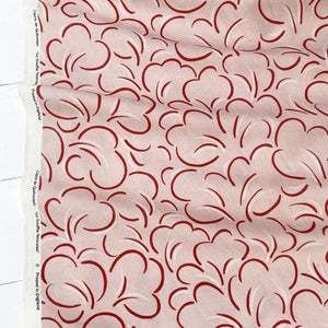 Paola linen by Claire de Quénetain in pink, full repeat of looping line work