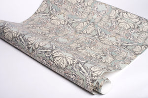 Papilio wallpaper by Victoria Sanders in green, roll showing a mirrored butterfly design