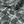 Passementerie wallpaper by Dami and Em Design in blue, roll showing tassels and trimmings