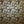 Passion Flower wallpaper by The Monkey Puzzle Tree in gold and black, full repeat of passion flowers