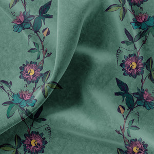 Passion Flower velvet by Tatie Lou in green, draped, showing trailing passion flowers