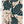 Peacock wallpaper by Dupenny in green, full repeat of peacocks in branches