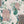 Peacock Manor wallpaper by Brand McKenzie in pink, pattern detail of peacocks and arched windows