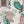 Peacock Manor wallpaper by Brand McKenzie in pink, close view of peacocks and arched windows