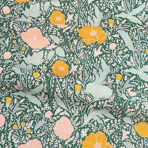 Philippa linen by Claire de Quénetain in pink and green, full repeat of a hand-painted floral design