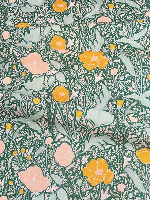 Philippa linen by Claire de Quénetain in pink and green, full repeat of a hand-painted floral design