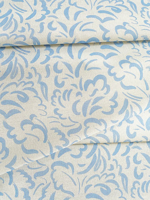 Pia linen by Claire de Quénetain in blue, full repeat of scattered leaves
