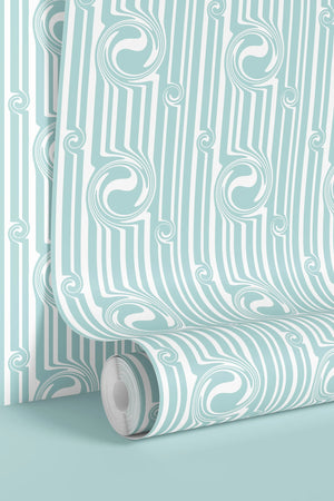 Popsicle wallpaper by Liberty James Studio in duck egg blue, partly unrolled roll showing wavy popsicle stripes