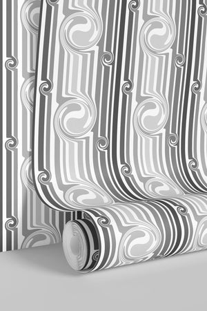 Popsicle in Five Shades of Grey wallpaper by Liberty James Studio in grey and white, partly unrolled roll showing
