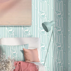 Popsicle wallpaper by Liberty James Studio in duck egg blue, wavy popsicle stripes behind a daybed in a child's room