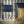 Popsicle wallpaper by Liberty James Studio in gold and navy, wavy popsicle stripes in a bedroom