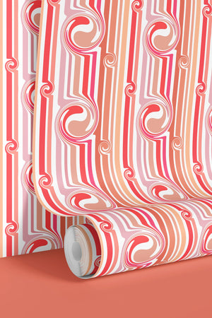 Popsicle wallpaper by Liberty James Studio in pink and coral, wavy popsicle stripes in a bathroom setting