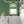 Popsicle wallpaper by Liberty James Studio in green, wavy popsicle stripes in a kitchen