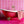 Popsicle wallpaper by Liberty James Studio in pink, sample roll showing wavy popsicle stripes