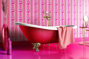 Popsicle wallpaper by Liberty James Studio in pink, sample roll showing wavy popsicle stripes