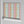 Popsicle wallpaper by Liberty James Studio in pink and blue, wavy popsicle stripes in a bathroom