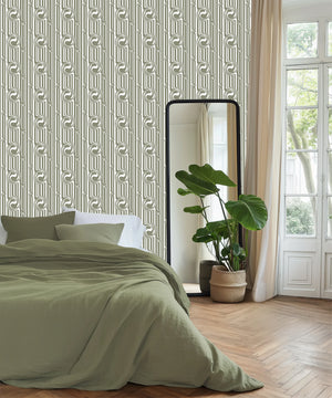 Popsicle wallpaper by Liberty James Studio in sage green, wavy popsicle stripes in a bedroom