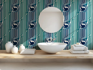 Popsicle wallpaper by Liberty James Studio in teal, wavy popsicle stripes behind a bed