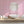 Popsicle wallpaper by Liberty James Studio in pink, wavy popsicle stripes in a bathroom