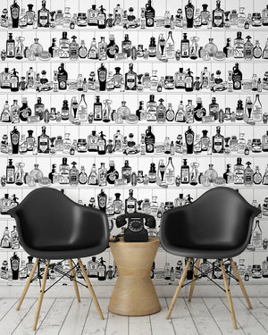 Potions wallpaper by Dupenny in black and white, shelves of potion bottles in a styled room setting
