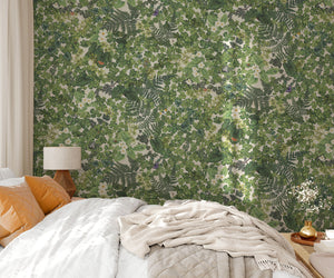 Woodland Floor wallpaper by Studio Le Cocq in green, woodland flowers and ferns in a bedroom