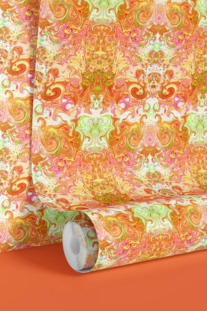 Psychedelic Pop Wallpaper wallpaper by Liberty James Studio in orange, sample roll showing a psychedelic mirrored design