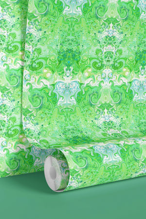 Psychedelic Pop Wallpaper wallpaper by Liberty James Studio in green, sample roll showing a psychedelic mirrored design