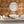 Psychedelic Pop Wallpaper wallpaper by Liberty James Studio in orange, a psychedelic mirrored design in a bathroom setting