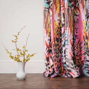 Rita Does Jazz velvet by The Monkey Puzzle Tree in pink and blue, an energetic painted design made into curtains