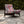 Rita Does Jazz velvet by The Monkey Puzzle Tree in pink and blue, an energetic painted design upholstered on an armchair