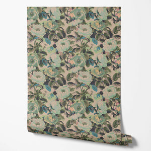 Rococo Roses wallpaper by Tatie Lou in sage green, partly unrolled roll showing painterly roses