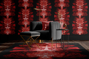 Ruby Elixir wallpaper by Liberty James Studio in black and red, mirrored art deco motifs behind a dining table