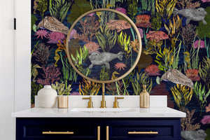 Seaview wallpaper by XV Interiors in navy, fish among seaweed in a bathroom
