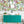Seaview wallpaper by XV Interiors in blue, fish among seaweed above a sideboard