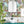 Seaview wallpaper by XV Interiors in blue, fish among seaweed in a bathroom