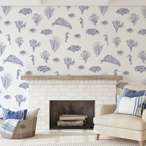 Solent Snapper wallpaper by XV Interiors in blue, fish, seahorses and coral in a living room
