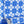 Santorini Tile wallpaper by Liberty James Studio in blue, roll showing a Mediterranean tile pattern