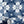 Santorini Tile wallpaper by Liberty James Studio in navy and white, a Mediterranean tile pattern in a styled room setting