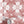 Santorini Tile wallpaper by Liberty James Studio in pink and white, a Mediterranean tile pattern above a sideboard