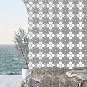 Santorini Tile wallpaper by Liberty James Studio in grey, a Mediterranean tile pattern in an interior setting