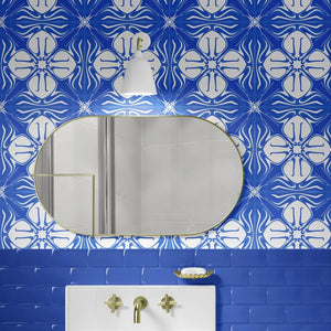 Santorini Tile wallpaper by Liberty James Studio in blue and white, a Mediterranean tile pattern on a bathroom wall