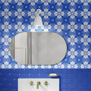 Santorini Tile wallpaper by Liberty James Studio in blue, a Mediterranean tile pattern in a bathroom setting