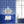 Santorini Tile wallpaper by Liberty James Studio in blue, a Mediterranean tile pattern on a bathroom wall