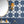 Santorini Tile wallpaper by Liberty James Studio in navy and white, roll showing a Mediterranean tile pattern