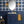 Santorini Tile wallpaper by Liberty James Studio in navy and white, a Mediterranean tile pattern on a bathroom wall