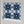 Santorini Tile wallpaper by Liberty James Studio in navy and white, a Mediterranean tile pattern in a bathroom