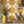 Santorini Tile wallpaper by Liberty James Studio in ochre and white, sample roll showing a Mediterranean tile pattern