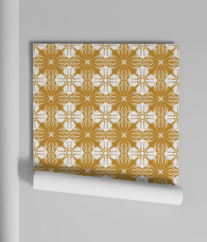 Santorini Tile wallpaper by Liberty James Studio in ochre, sample roll showing a Mediterranean tile pattern